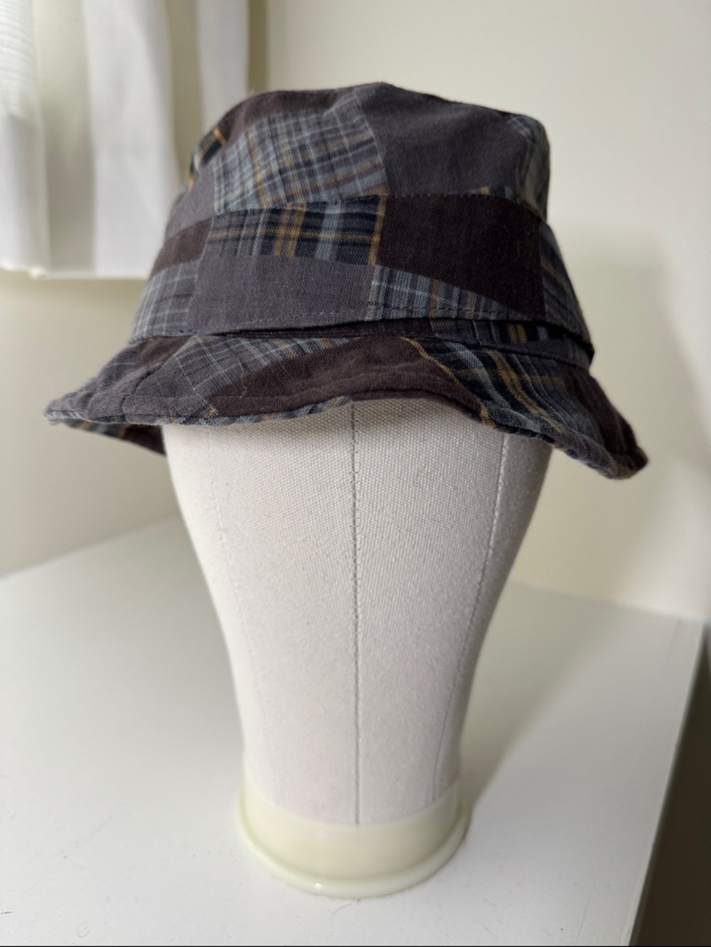 D&Y plaid patchwork cotton bucket hat. Runs small.